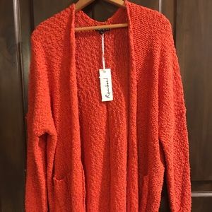 Rac heal Orange Popcorn Cardigan.
